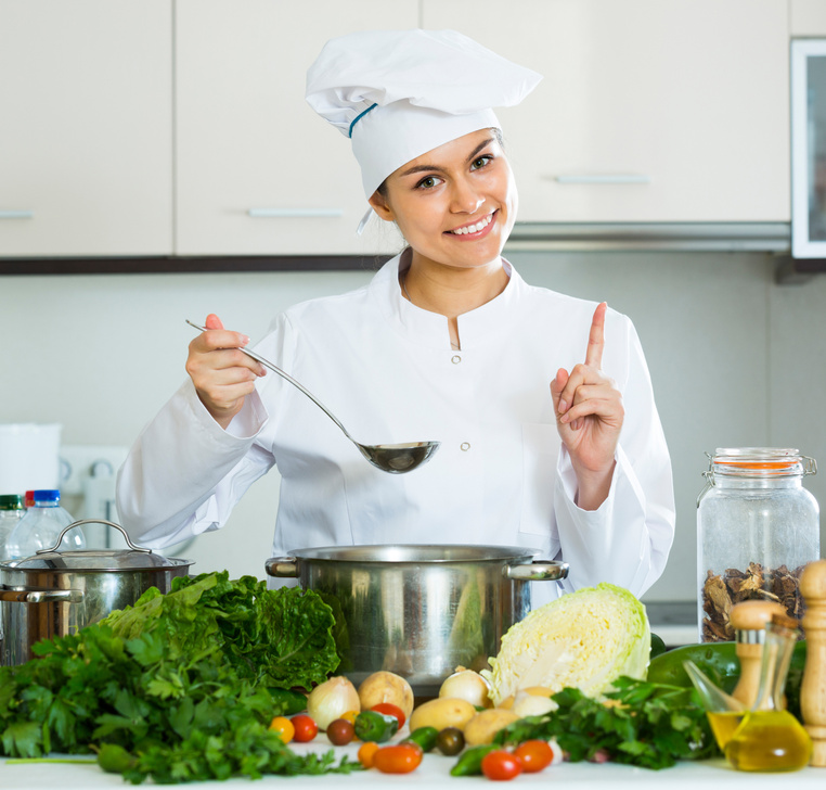 female cook vegetarian meal